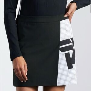 PXG. Big Logo Color Block Pleated Skirt.